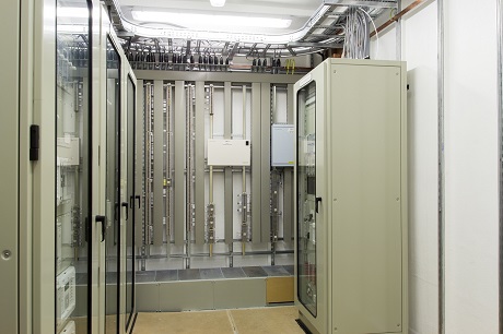 Portable substation internal view showing protection panels and primary marshalling field